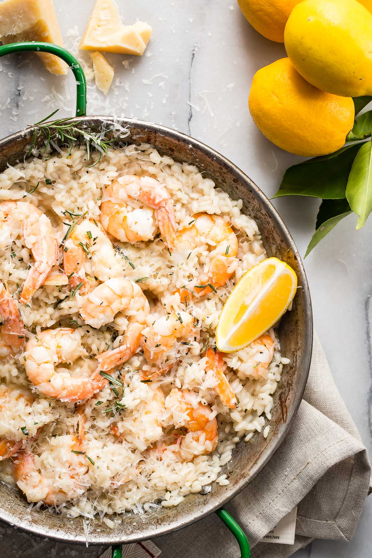 Creamy lemon shrimp risotto with rosemary and fresh Parmesan cheese